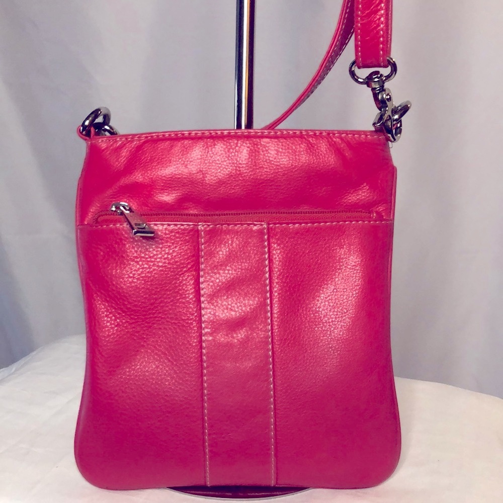 PIELINO fuchsia genuine leather crossbody. Made in India. Adjustable straps.
